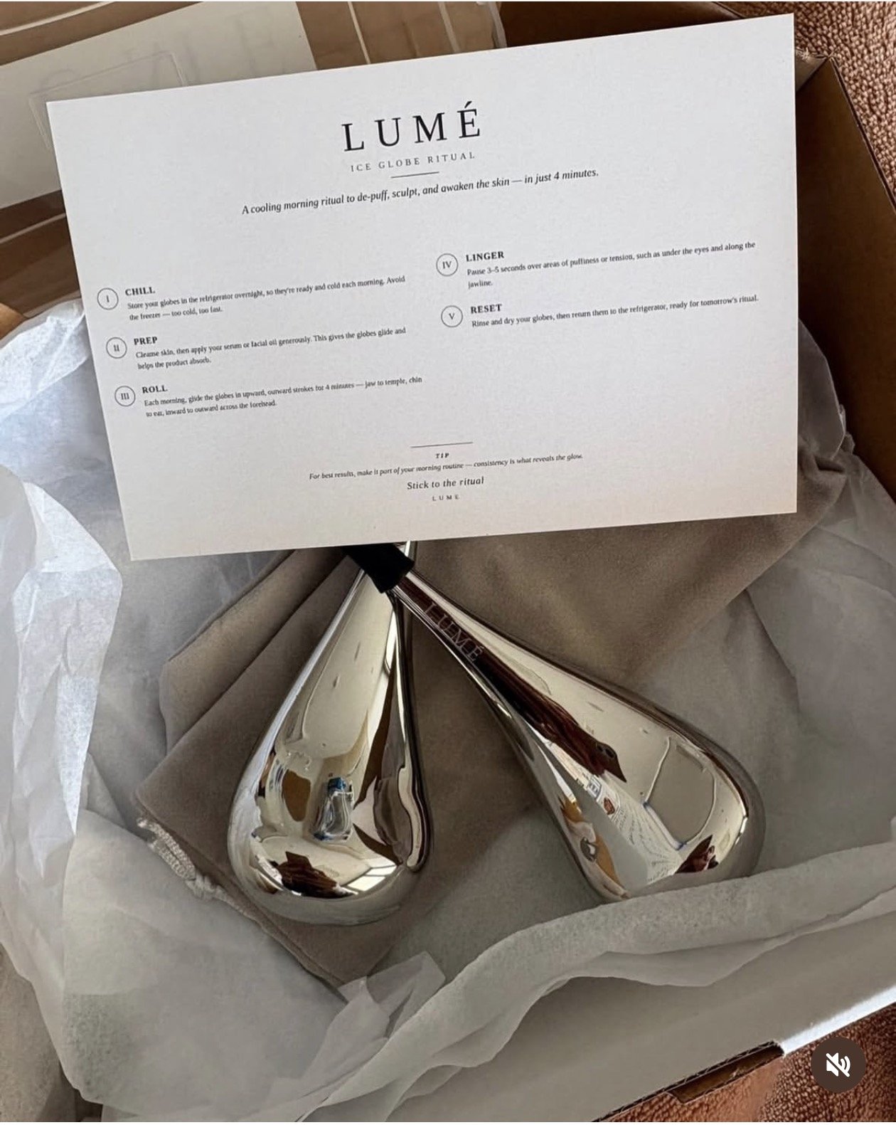 LUMÉ Cryo Globe Set unboxed with the printed ritual guide